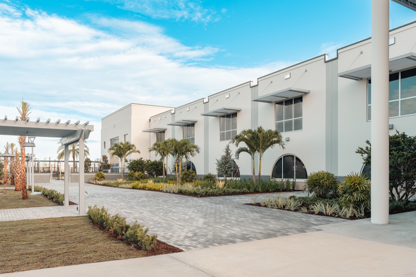 Campus walkway and landscaping at Somerset Academy Avenir