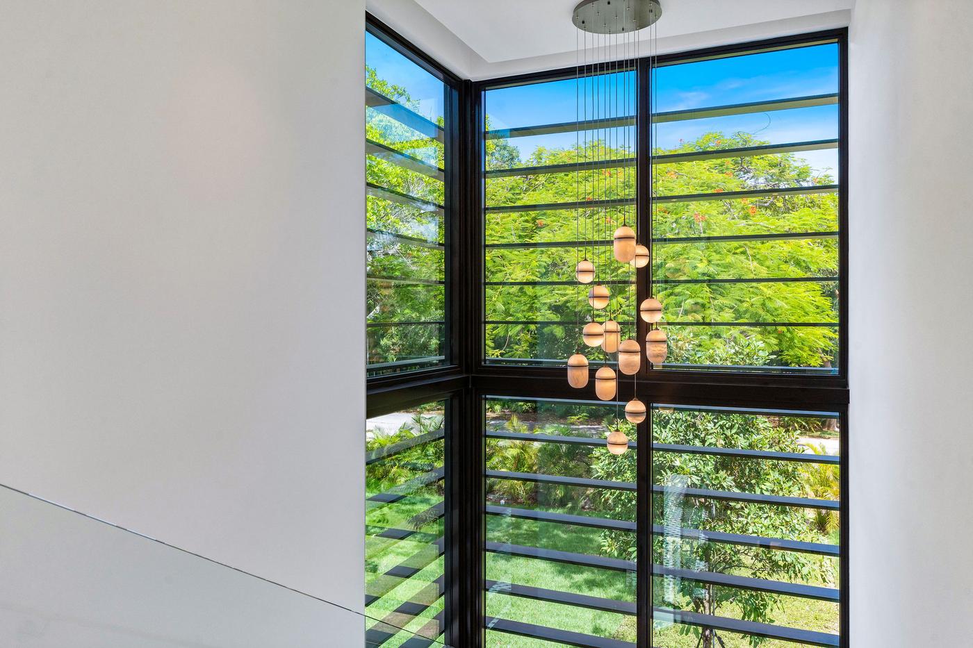 Two story glass stair wall
