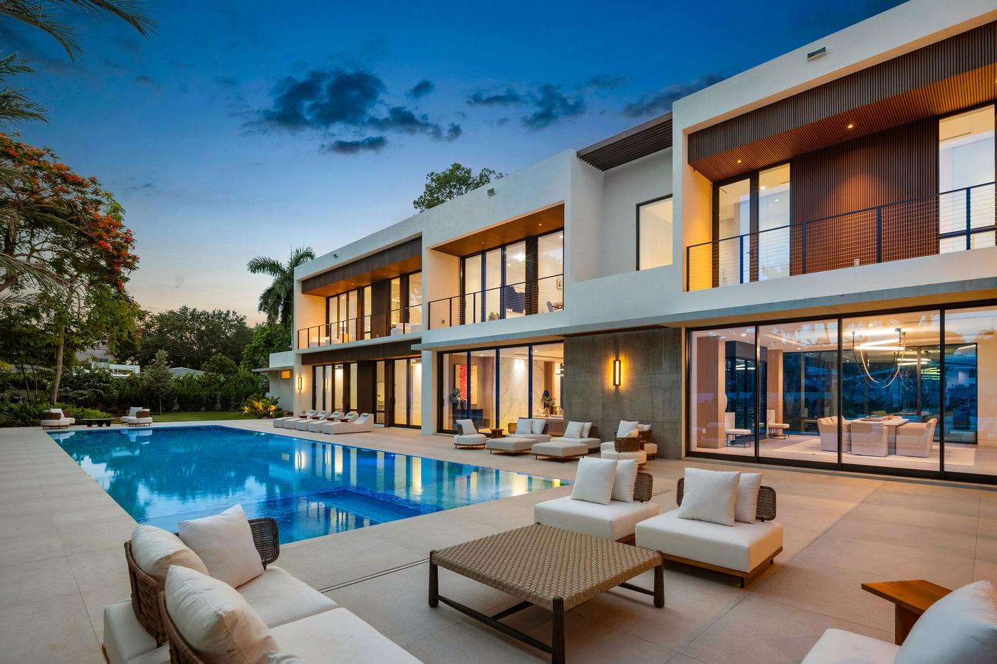 Twilight view of the pool and terrace